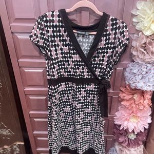 Cross-over top with tie. Light, silky and flattering